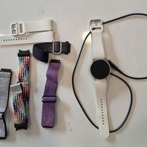 Versatile White Smartwatch with Multiple Bands